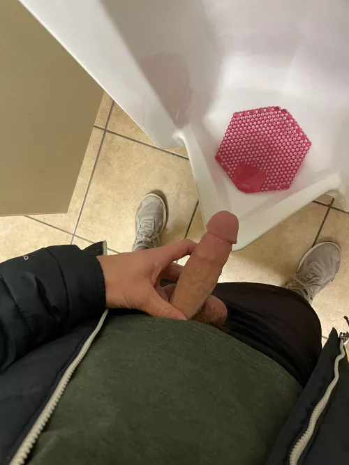 Watching guys pee next to me gets me turned on at a urinal