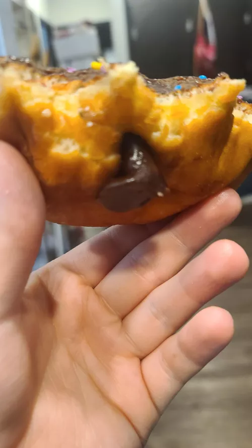 a chocolate frosted dildo In my donut