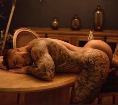 “Inked muscle butt” …