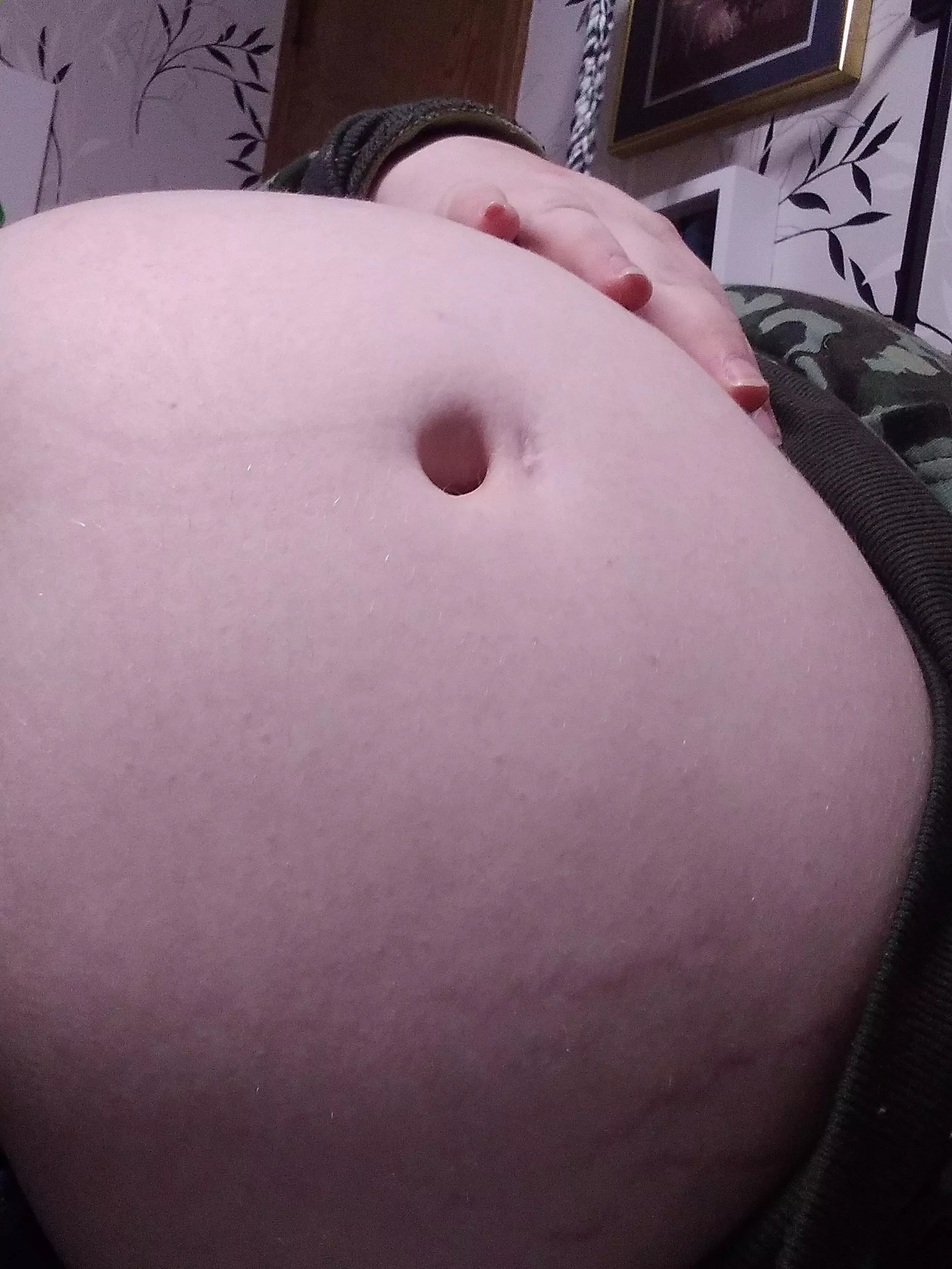 my belly is all bloated up sick from too much snacking >.<