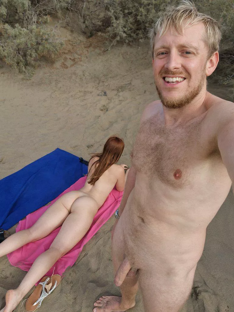 Nudist couple enjoying being naked in nature