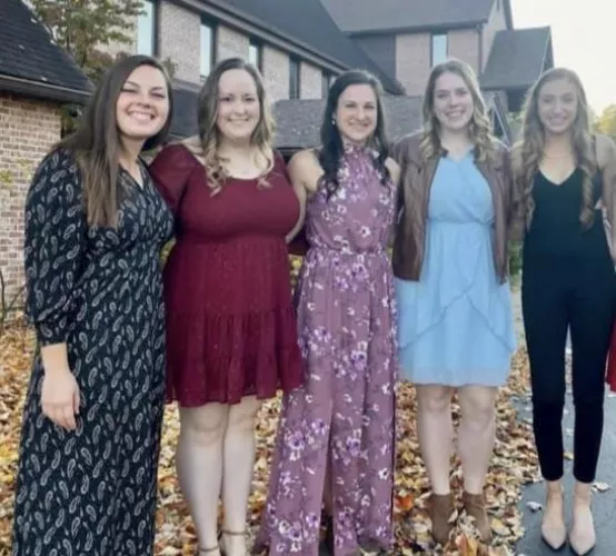 Red dress is head and breasts above the rest