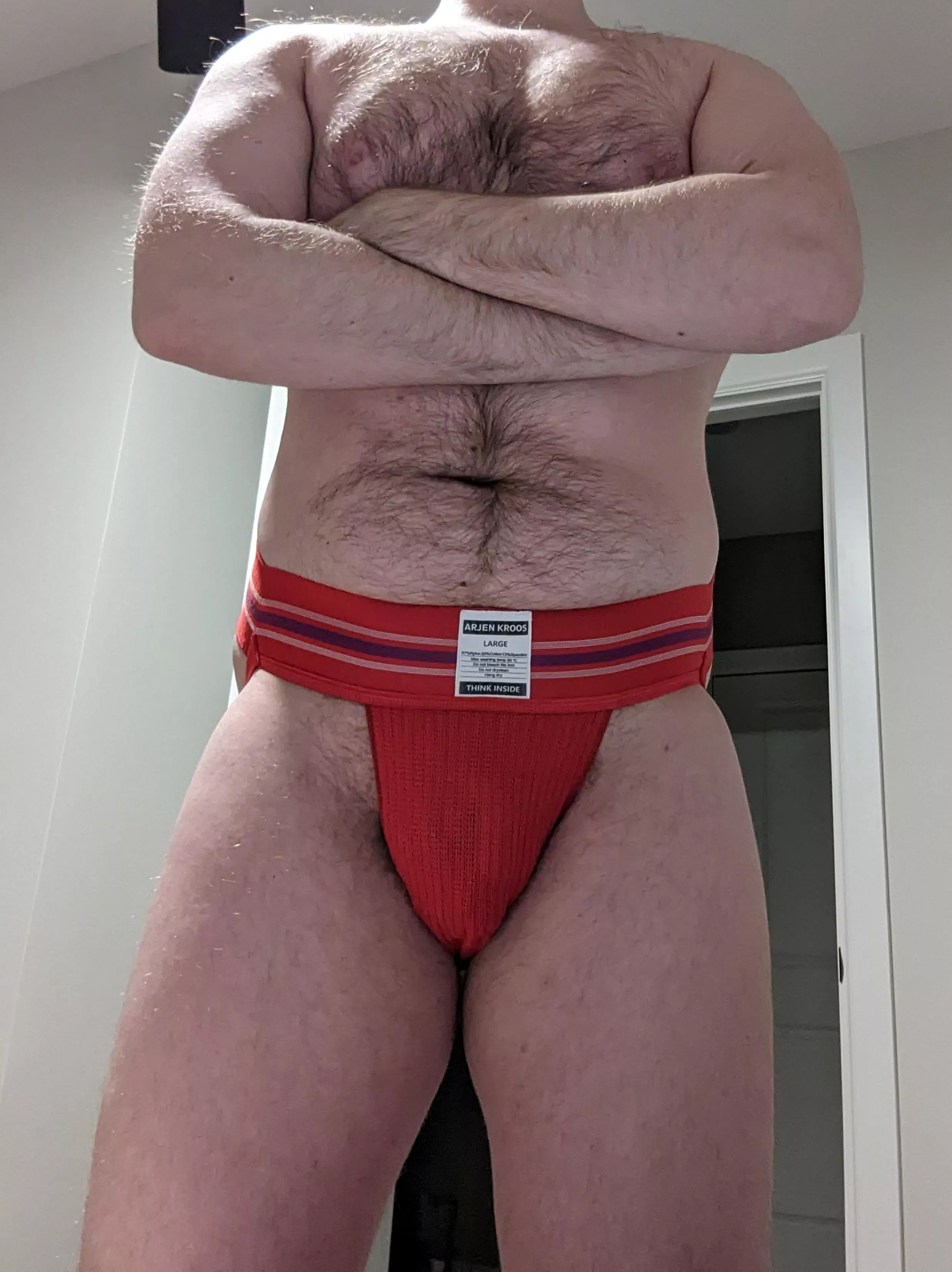 trying on the red jock