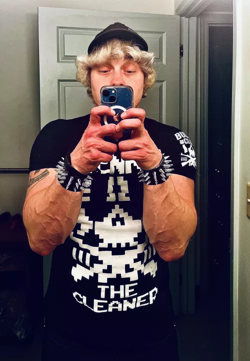 When your friend gets you a cool shirt for Christmas, you wear it. Even if you hate Kenny Omega.