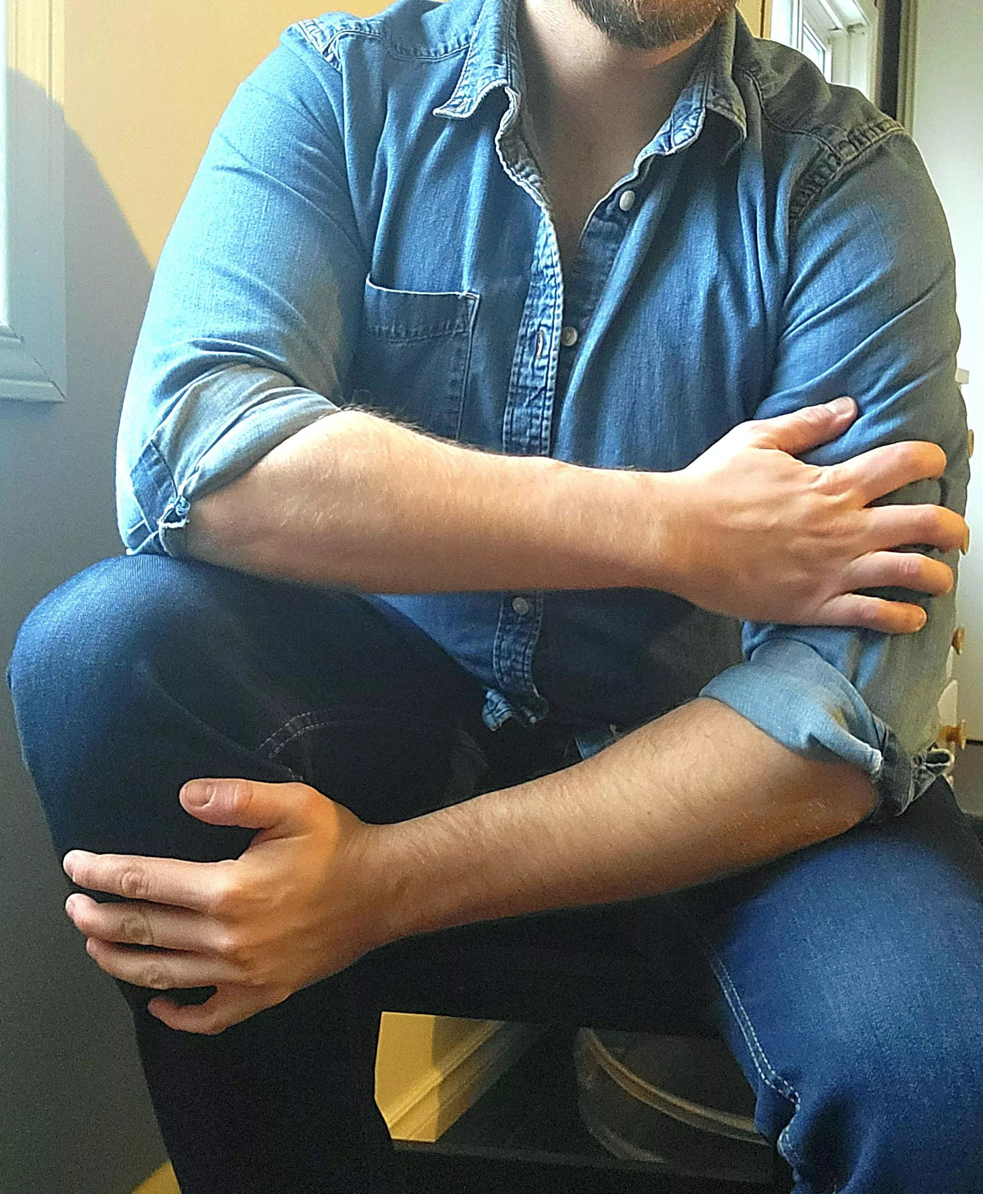 Some forearms with a side of denim.