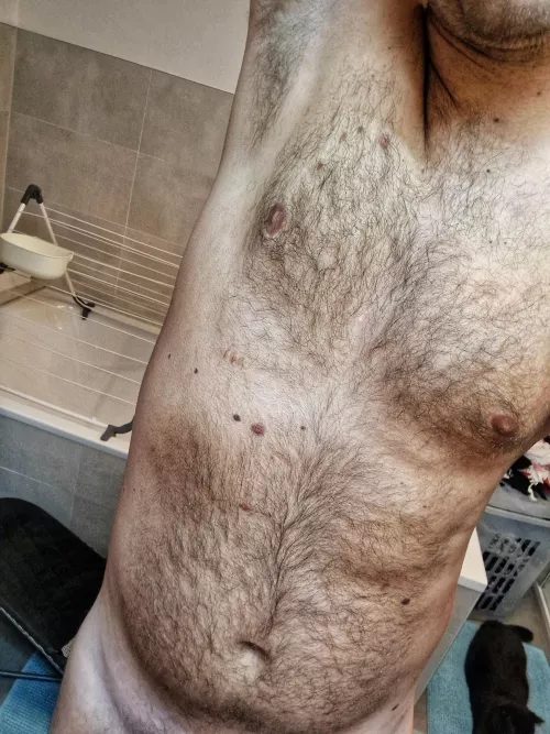 a light stretching in front of the mirror