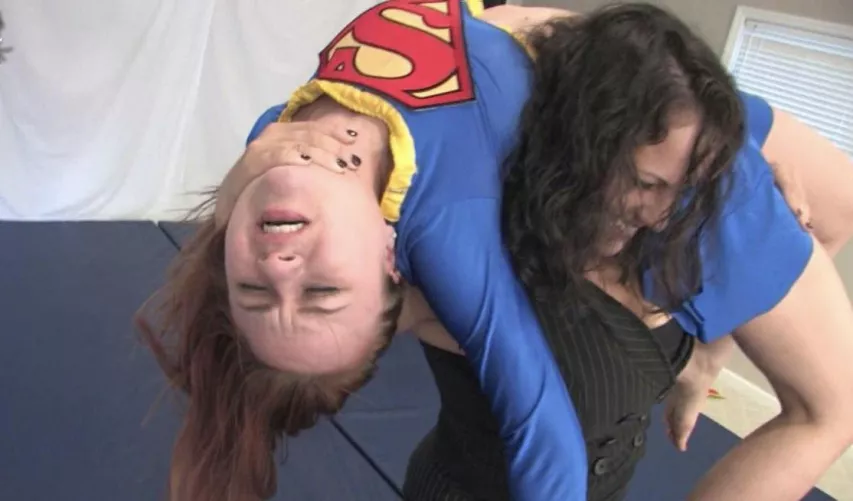 The Maid of Might being bent in half