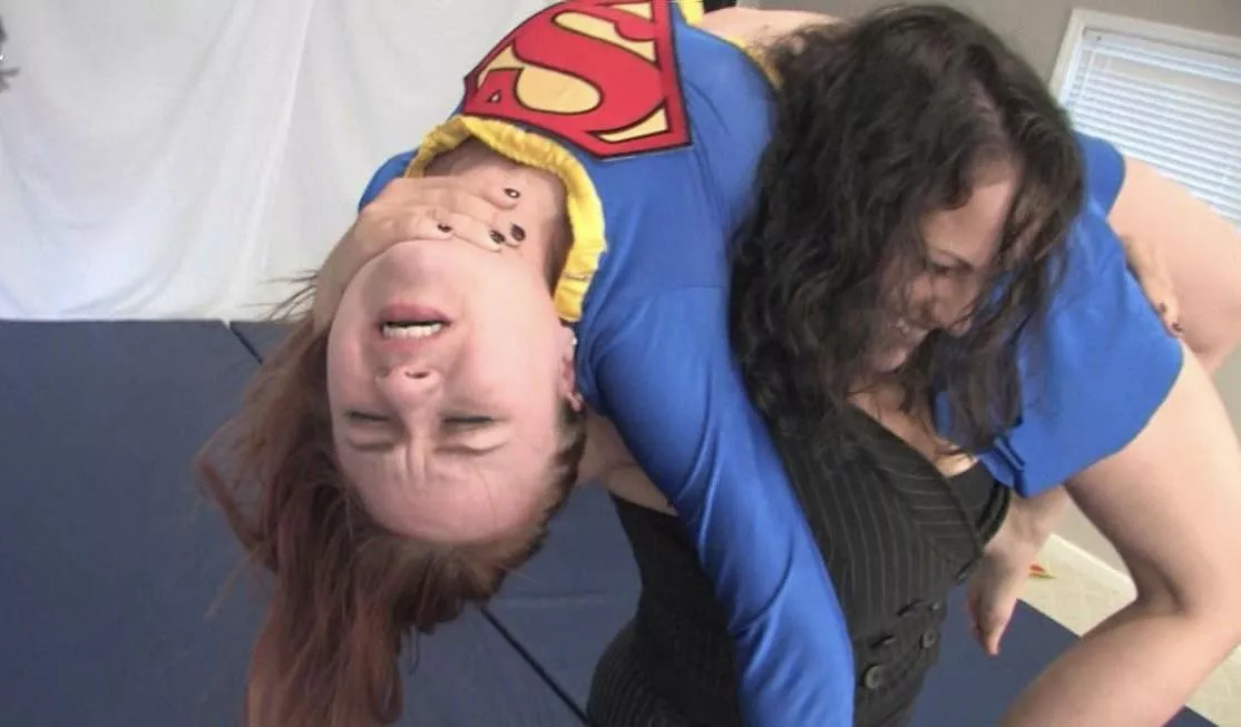 The Maid of Might being bent in half