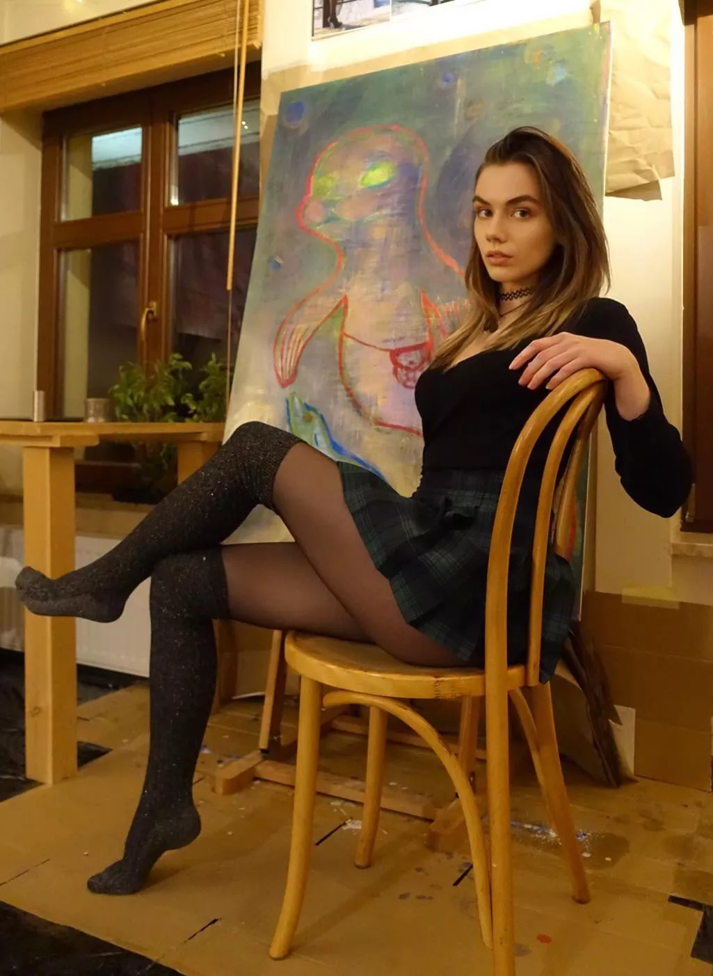 Green schoolgirl skirt, holographic green painting, silver knee socks, black nylons