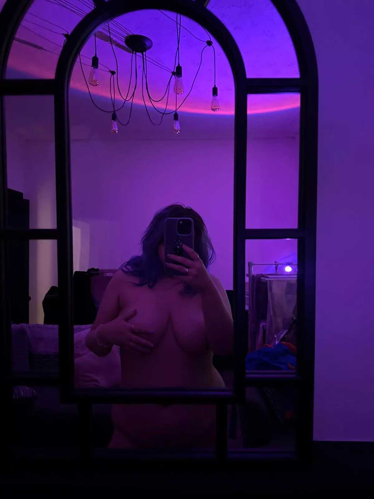 Liking how I look in the purple light 🥰