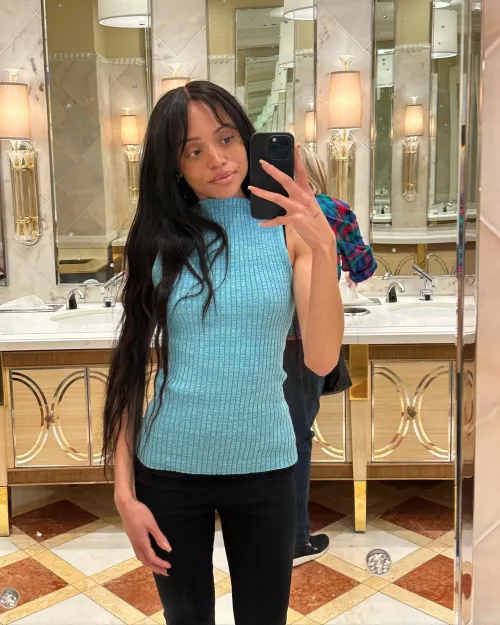 Looking at her own freckles