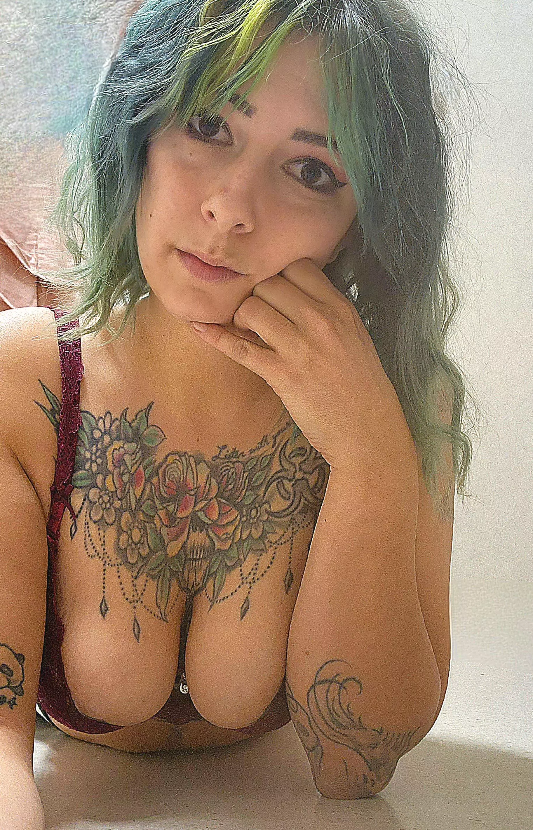green hair and tattoos
