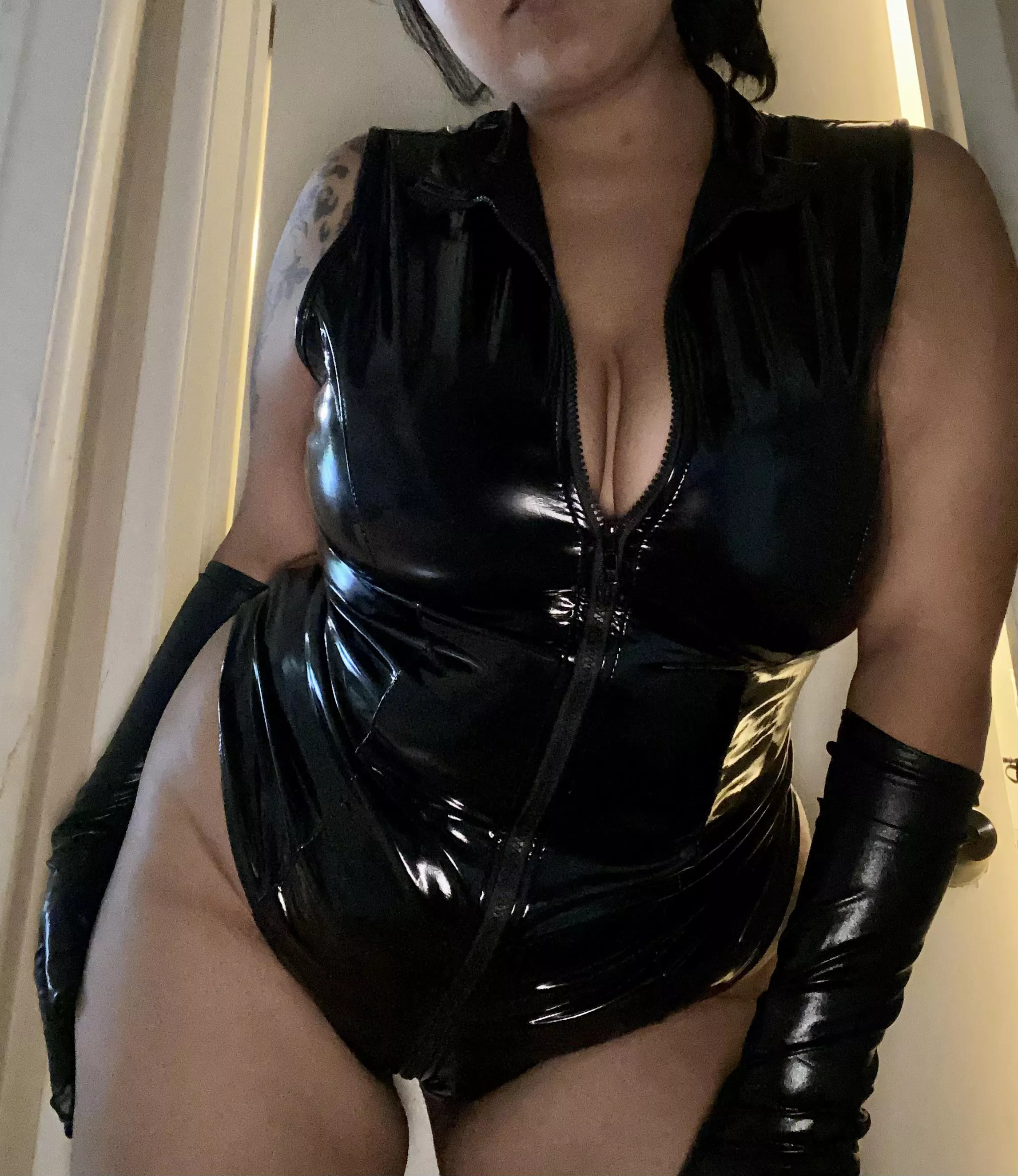 i love how this PVC bodysuit hugs my natural curves
