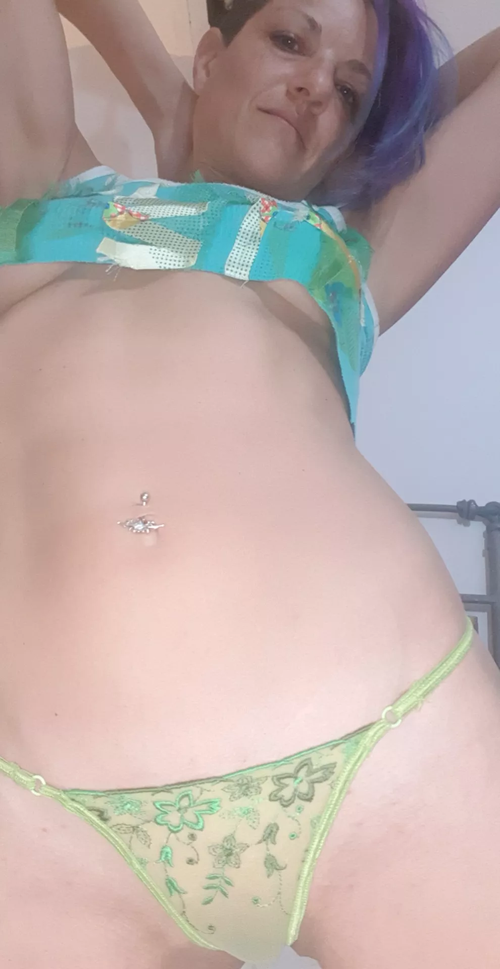 small but peeking out from under the top