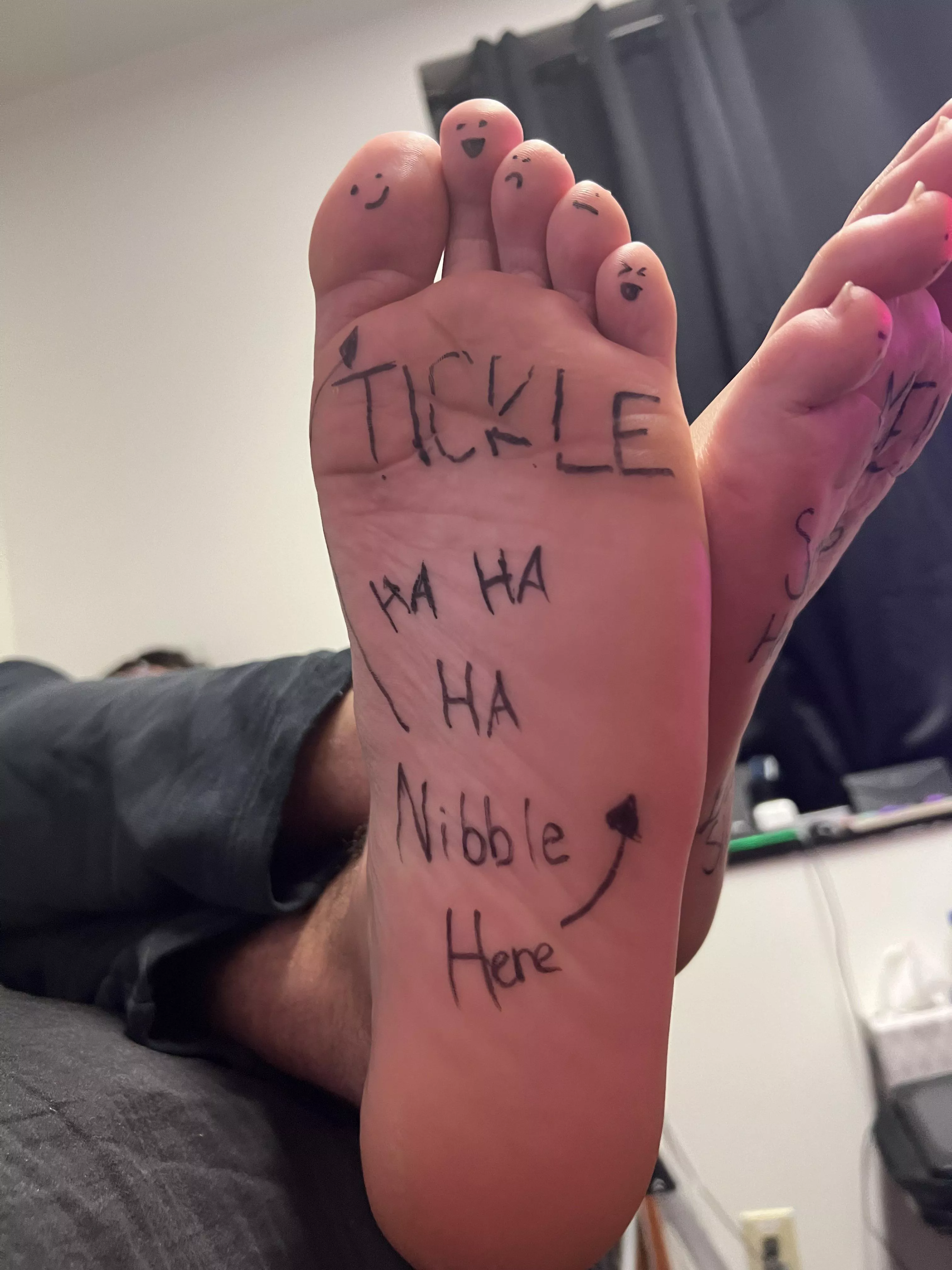Cute pics of when my gf decided to vandalize my ticklish soles with her pen 😳