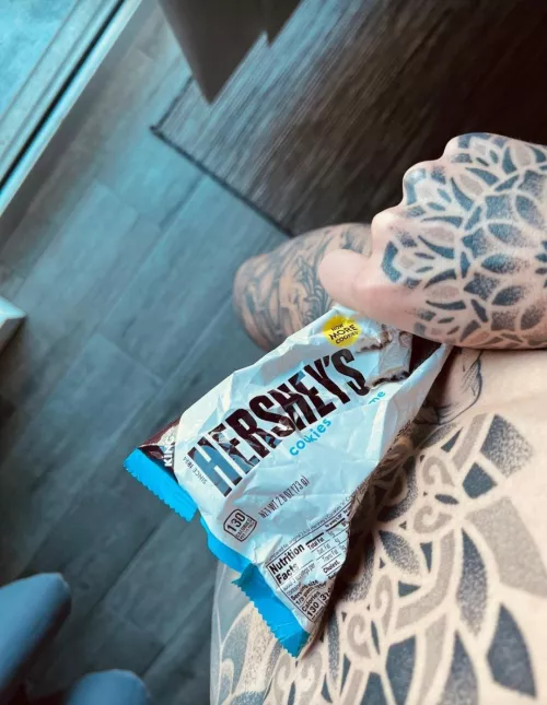 Eating a candy bar. These things are addictive