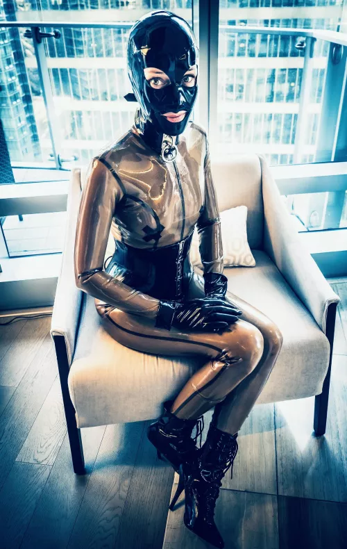 Rubberdoll on her best behaviour