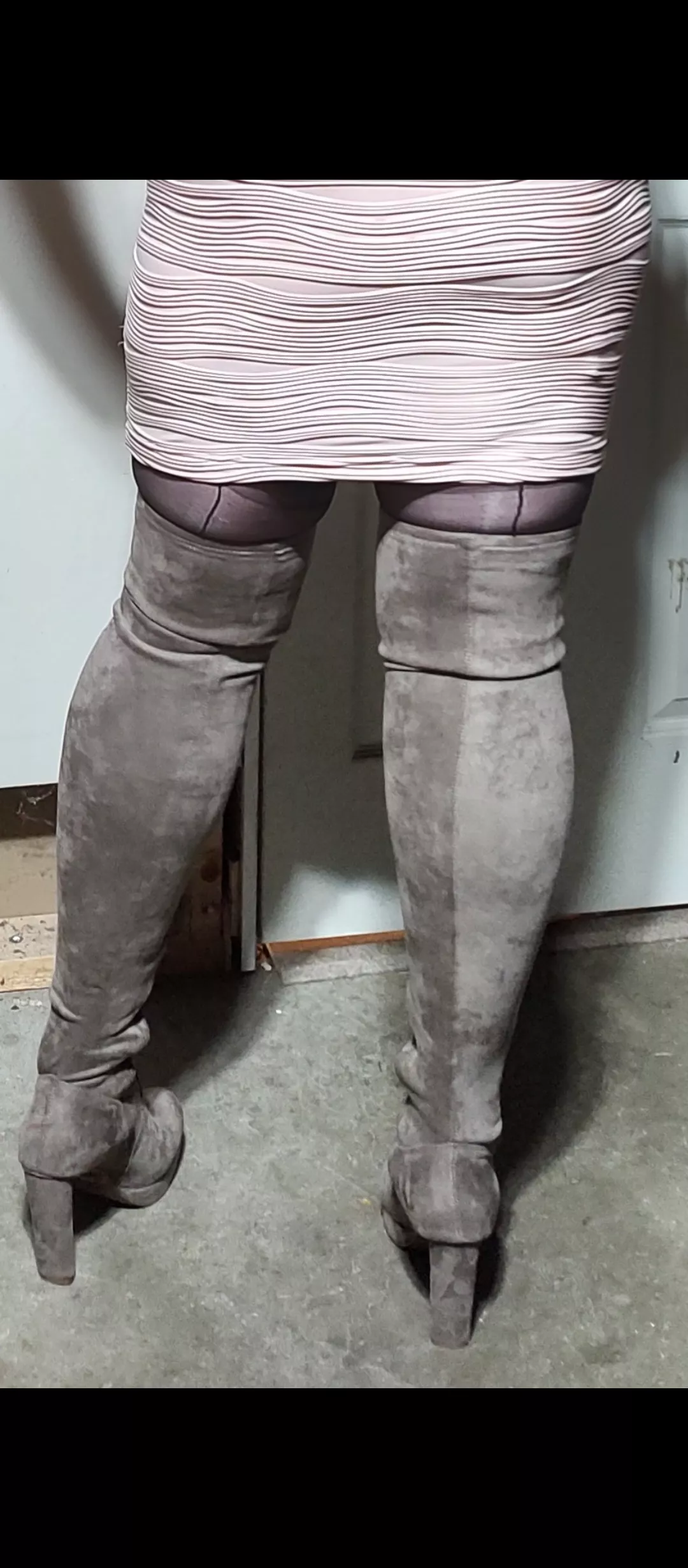 [M] Thigh high boots.
