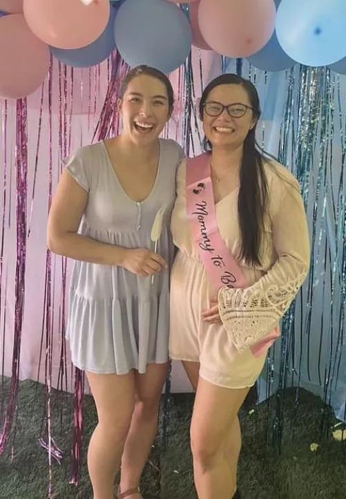 Asian girl with her pregnant sister