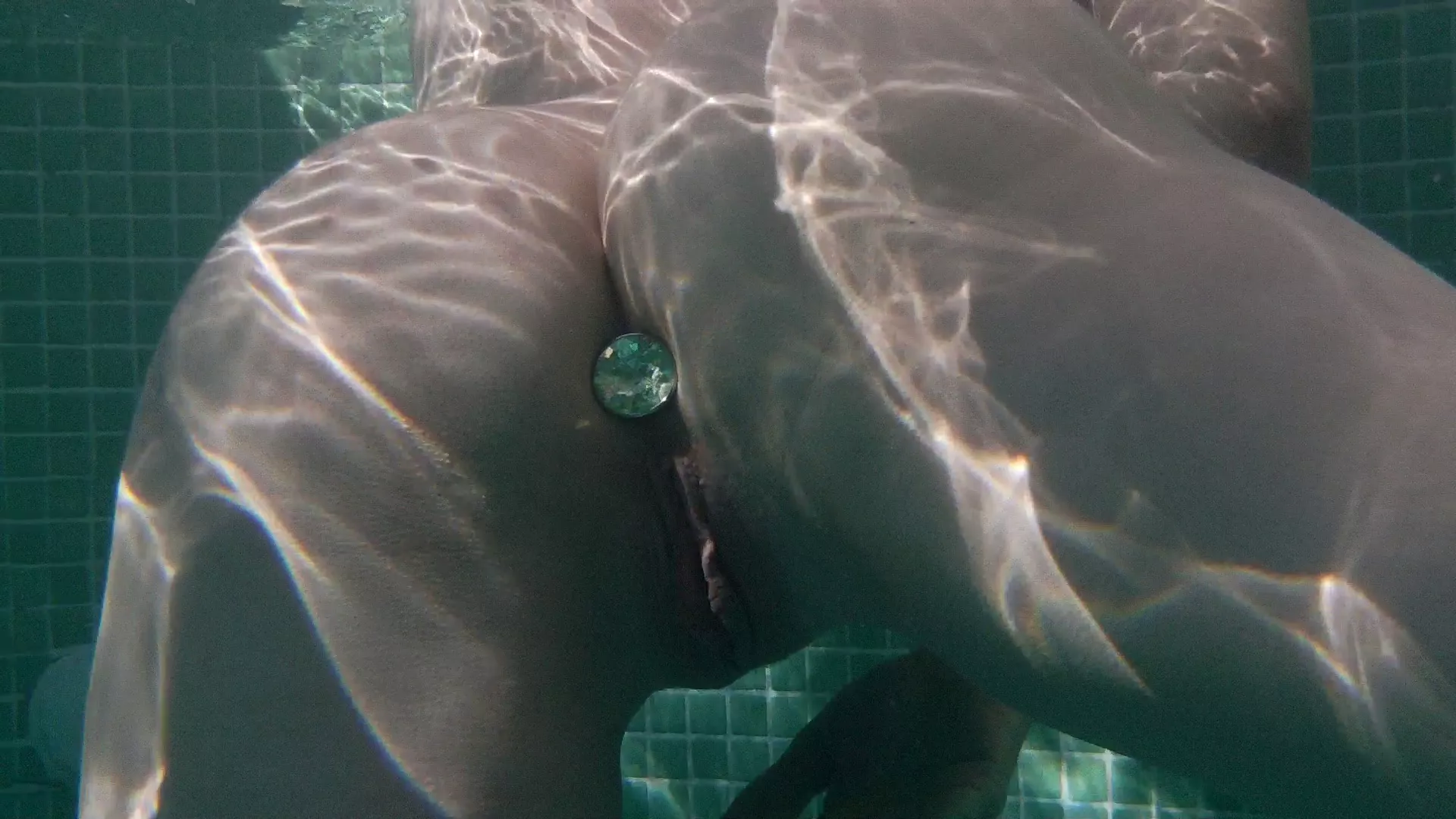 My underwater milf ass plugged in the public pool at the swinger hotel