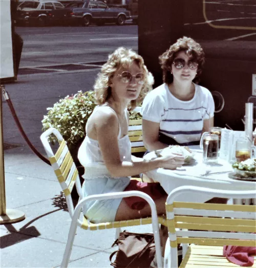 Blue miniskirt and a very thin white cotton top....