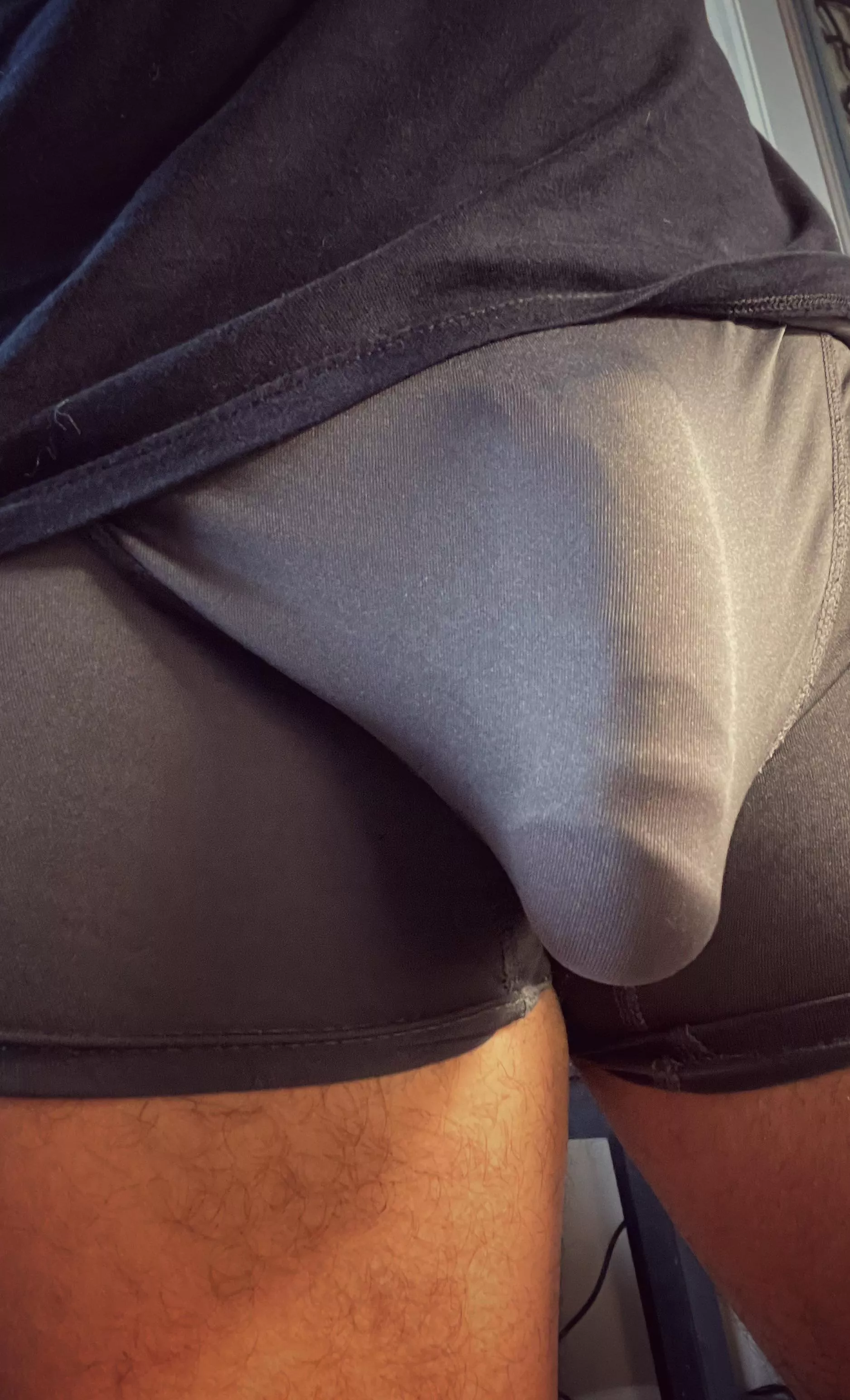 Pulls back the skin.