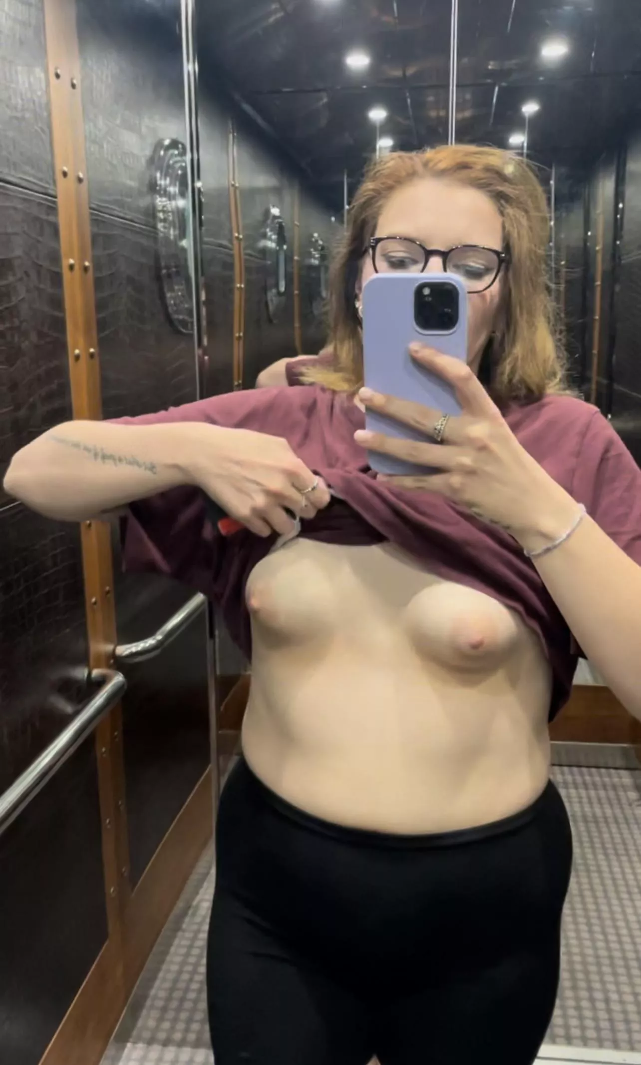 Showing off in the lift