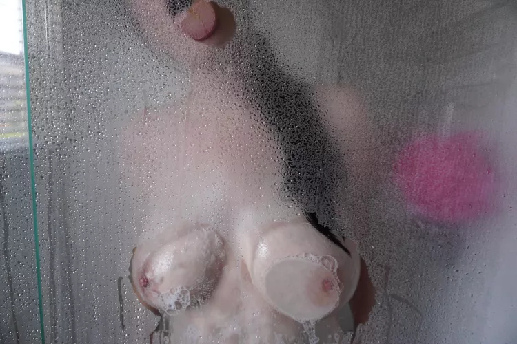 Brunette washing off after a 12k