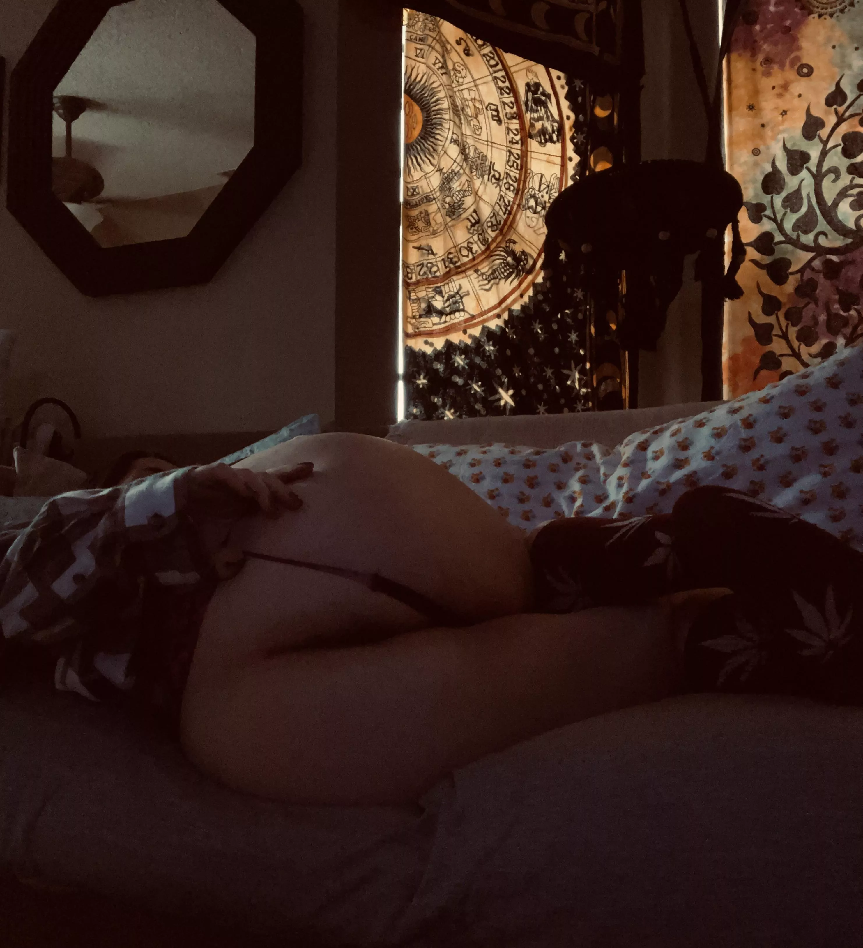 From the back on the couch. I’ll hold them.