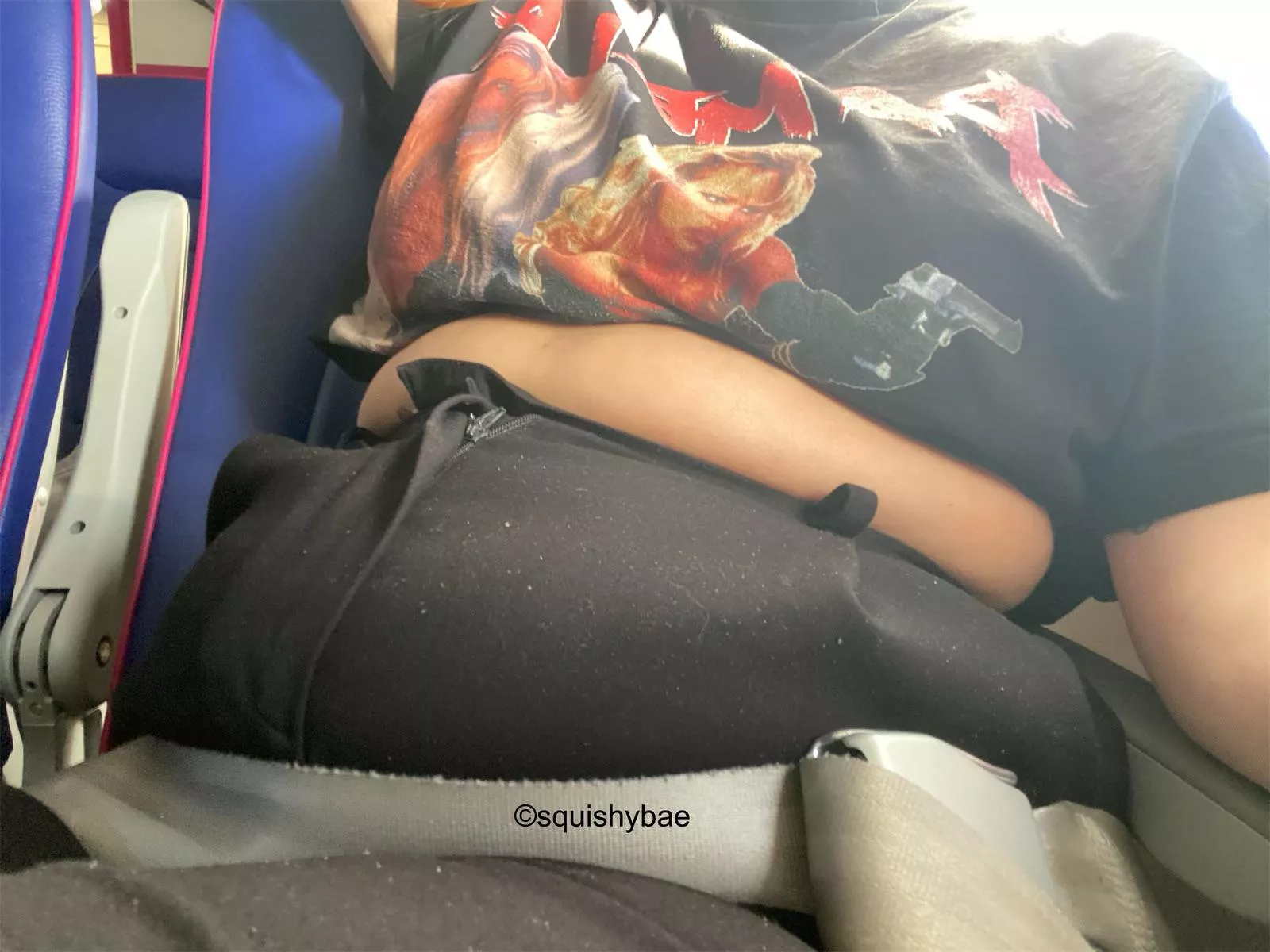 On the flight to my all inclusive holiday but I’m already hanging out of my pants? Also note the sugar on my pants from my snacks 🤭