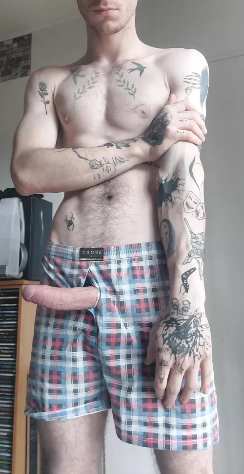 poking fully through the boxers