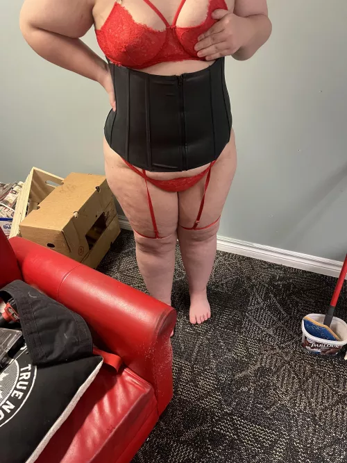 Cleaning in her corset and lingerie