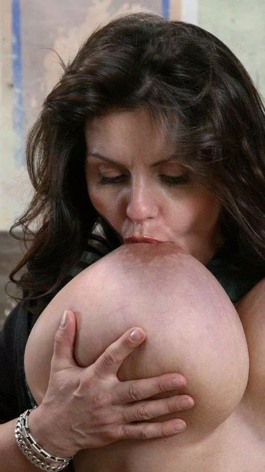 Beautiful Milena sucking her own huge tit