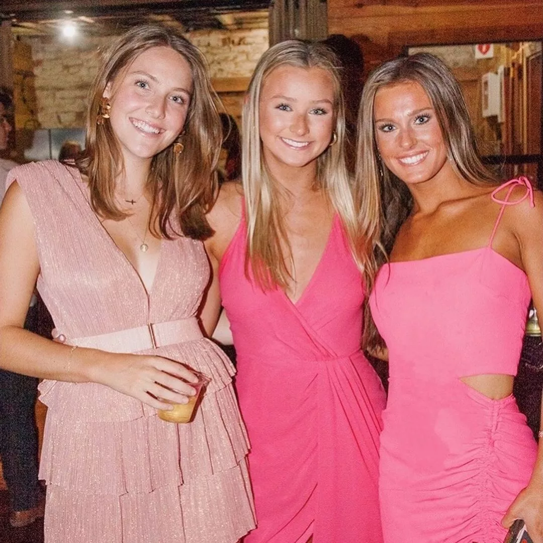 Blondes in pink dresses