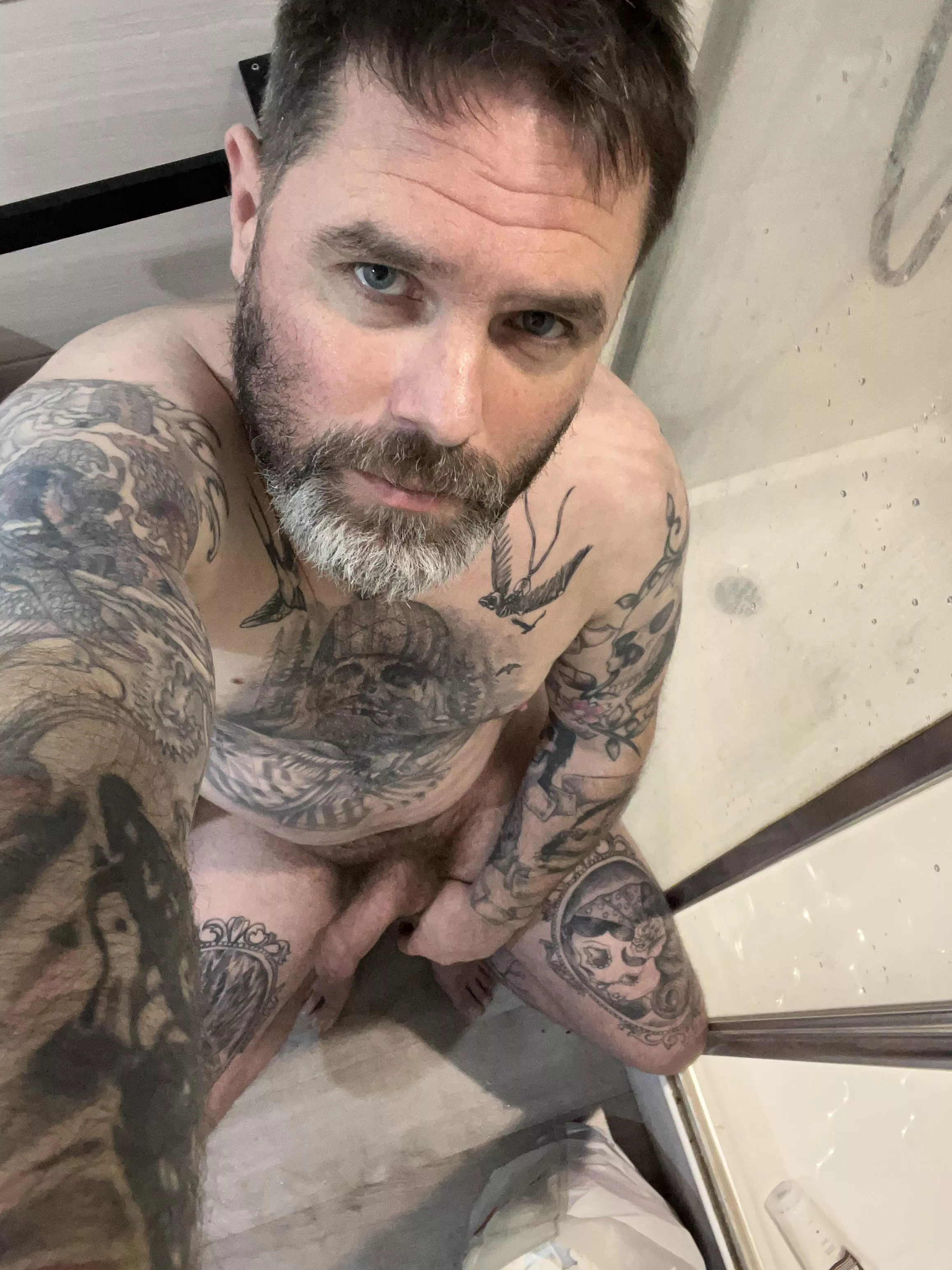 Just a guy showing of his tattoos