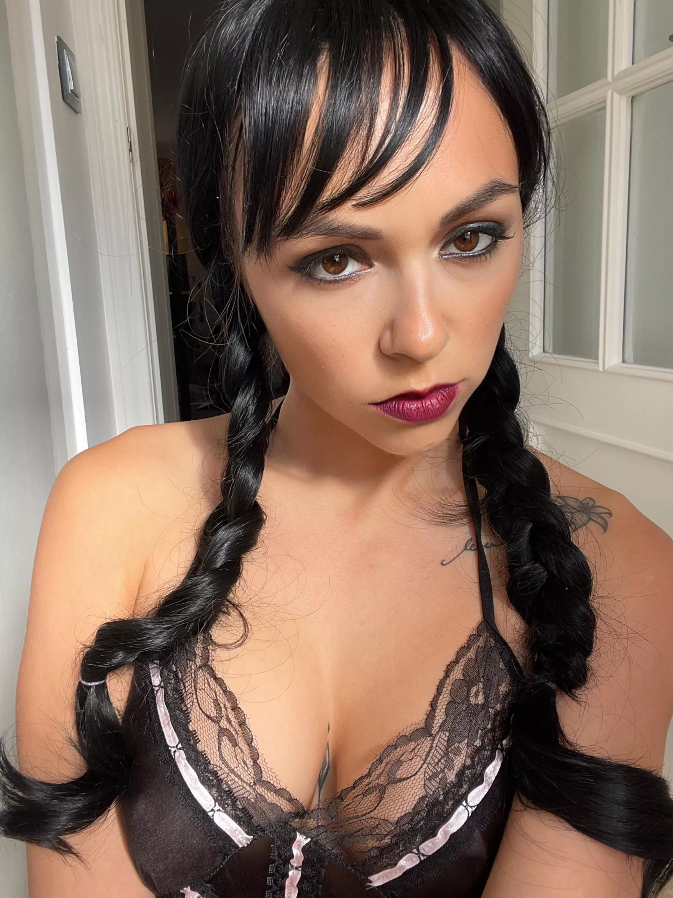 Wednesday may have tattoos