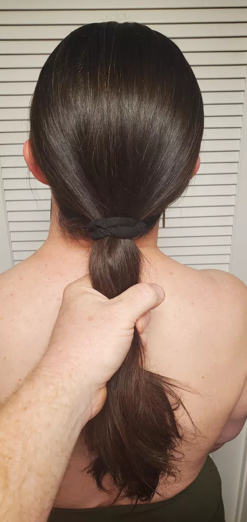 Pulling her thick silk