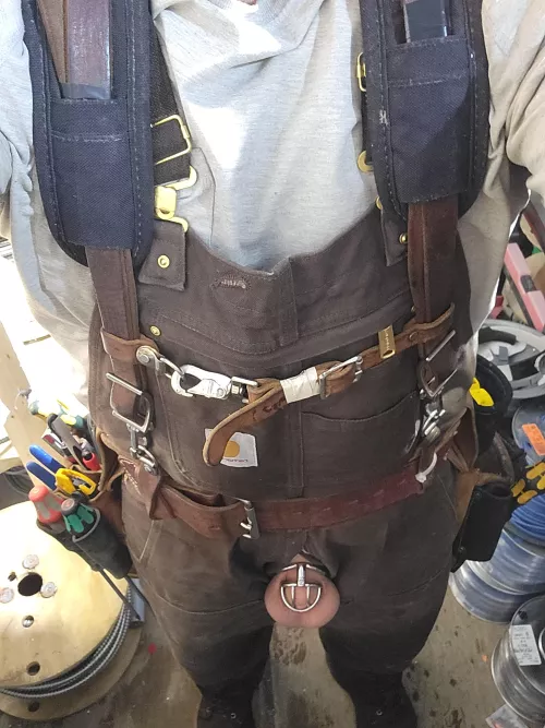 Hubby locked up at work with his 2inch metal butt plug in. Such a good boy for his wife.