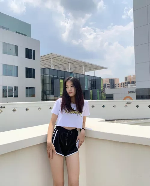 Petite Asian in shorts
