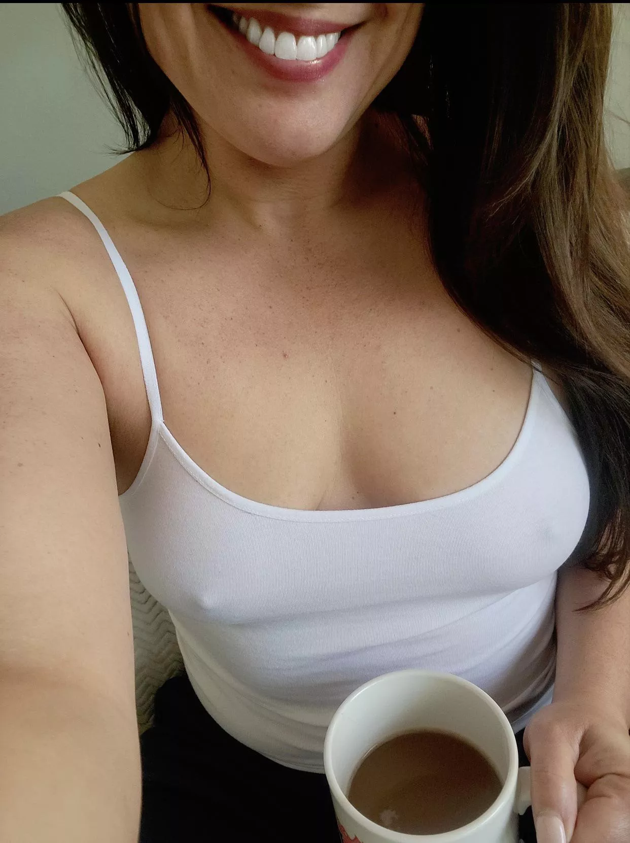 Pokies, white tank, and coffee make for a great morning