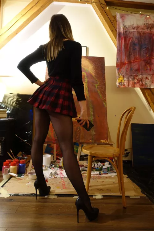 Recently finished wolfs painting, heels, schoolgirl skirt and nylons