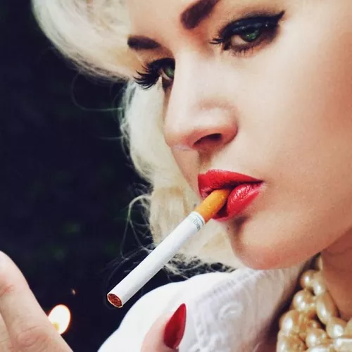 Gia Genevieve lighting up