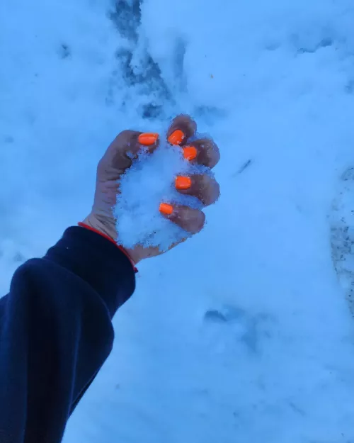 my hands in the snow, slowly freezing