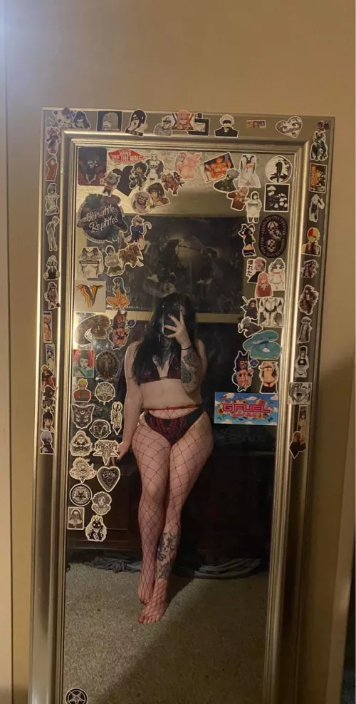 Black hair, red fishnets, nsfw mirror selfie 😉