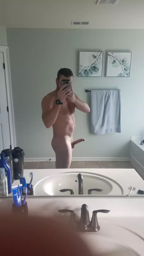 Bearded and long hair pulled back