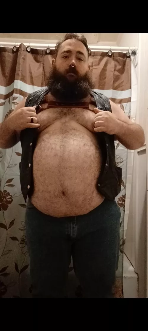 checking the leather before heading out to the bar.