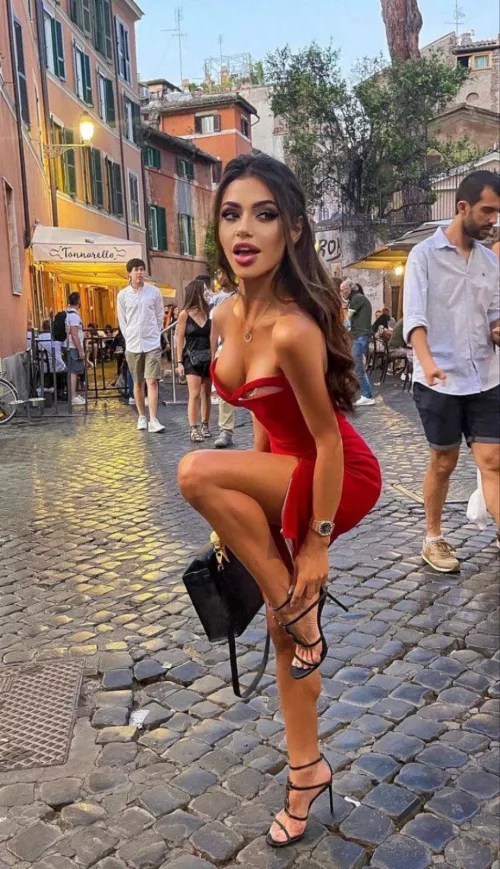 Red looks good on her