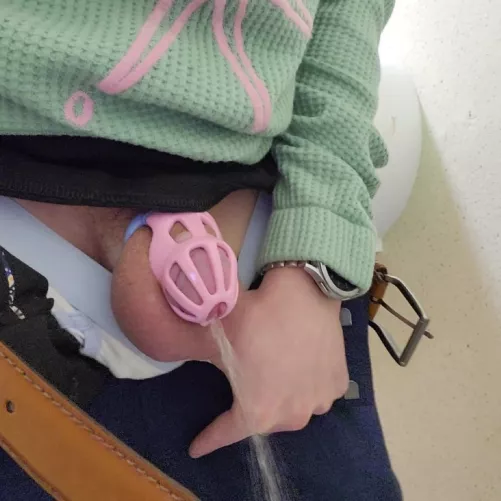 Hard to aim my little caged cock.. don't waste it, open wide!