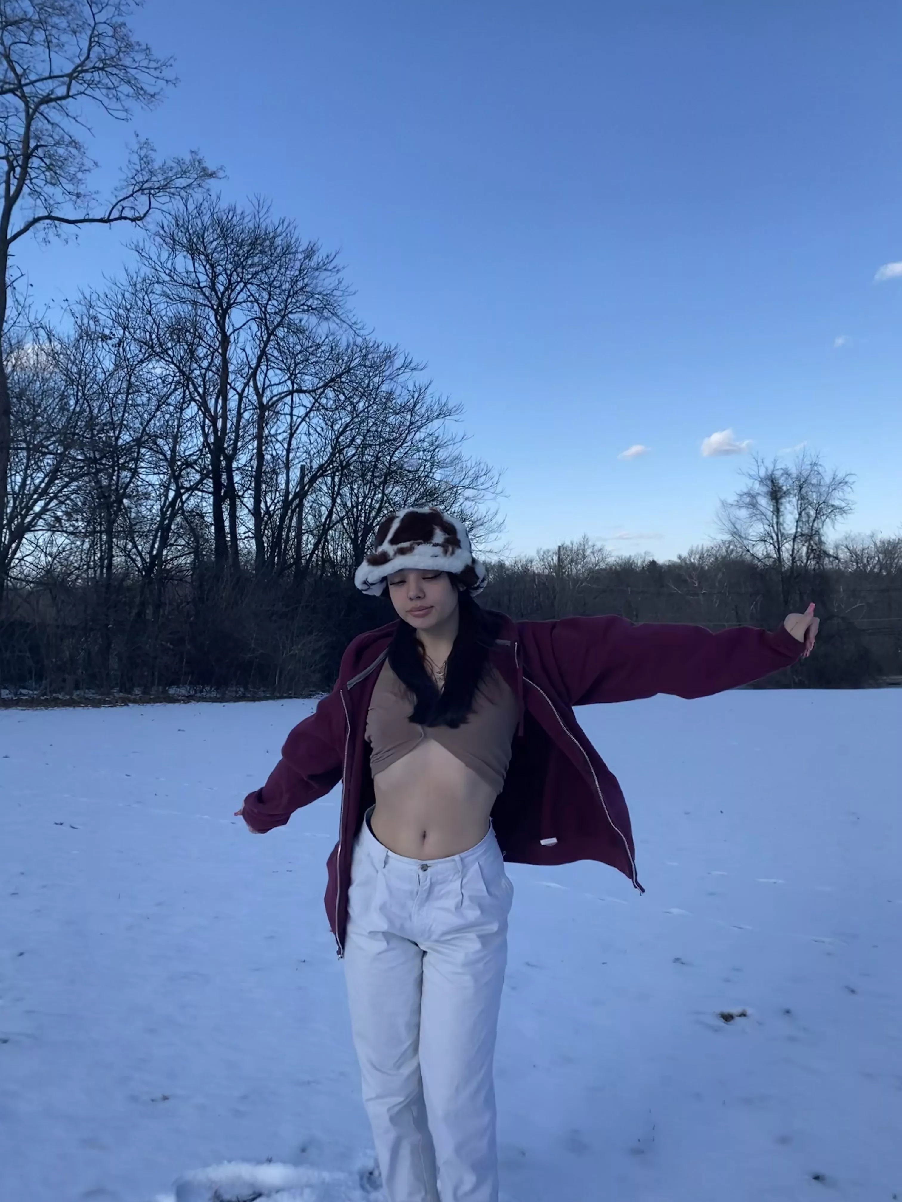 White jeans in the snow with a sexy smile
