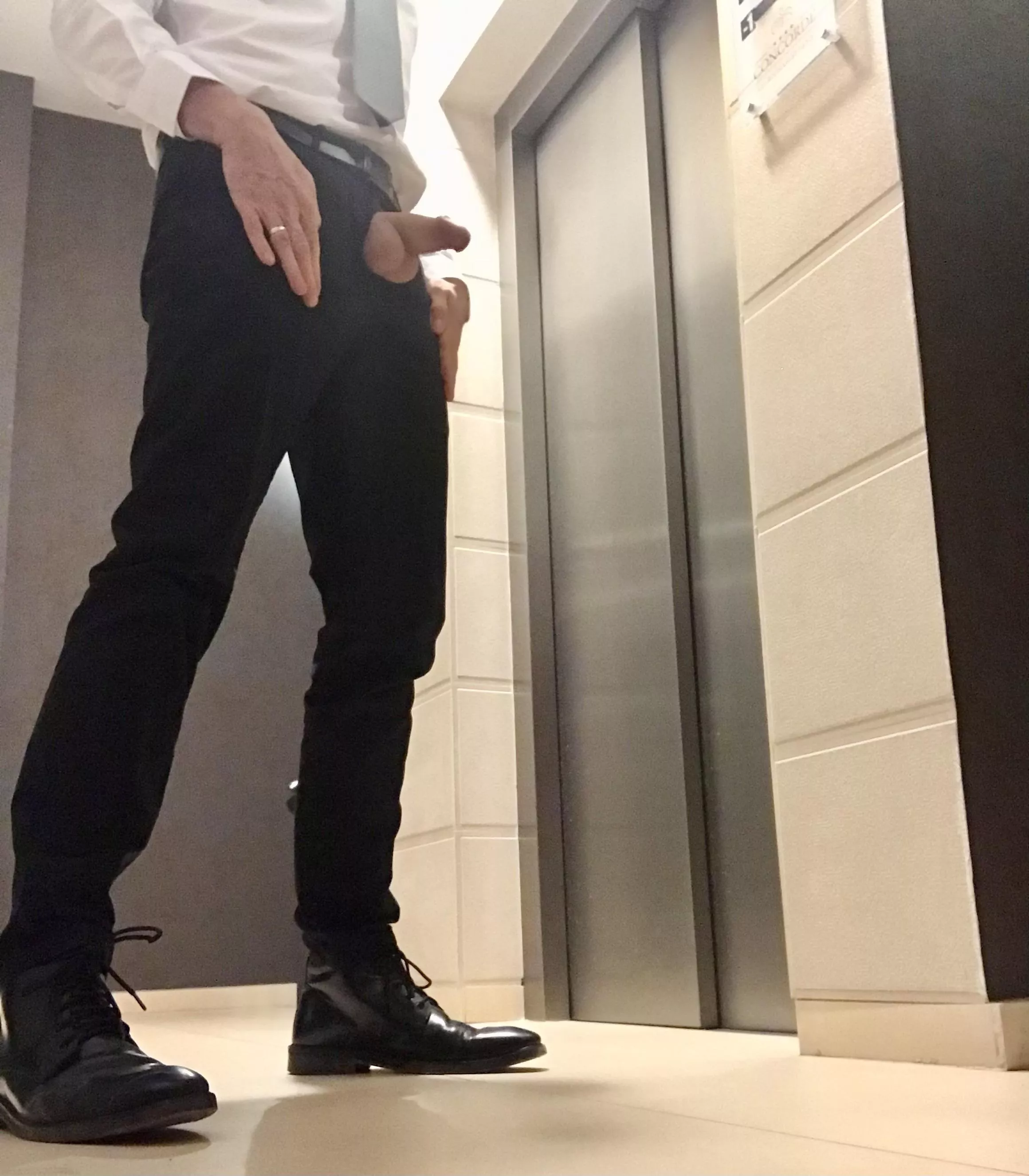 Cock out in front of hotel elevator. Only semi as had to be really quick, a lot of people around.